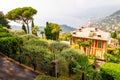 Foggy panoramic view of Ligurian coastline landscape. Graduated green mountain chains full of small towns and villages. Liguria is Royalty Free Stock Photo
