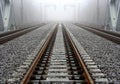 Foggy railroad track