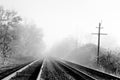 Foggy Railroad Tracks Royalty Free Stock Photo