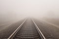 Foggy railway landscape. Royalty Free Stock Photo