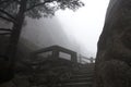 Foggy Rainny day. Stone Steep Steps . Treking walking hking Huangshan Mountain. Anhui, China. April 2009 Royalty Free Stock Photo