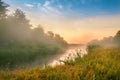 Foggy river in the morning. Summer misty sunrise on the river Royalty Free Stock Photo