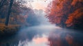 Foggy River Reflecting Autumn Trees and a Pink Sunset Sky Royalty Free Stock Photo