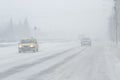 Foggy, snowed road with low visbility