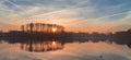 Foggy sunrise over lake Royalty Free Stock Photo