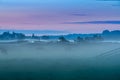 Foggy sunrise over the Sassenheim meadows along the Kagerplassen Royalty Free Stock Photo