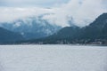 Foggy Teletskoye lake in Altai mountains