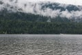 Foggy Teletskoye lake in Altai mountains