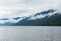 Foggy Teletskoye lake in Altai mountains