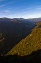 Foggy valley at autumn sunrise, Cemerno mountain Royalty Free Stock Photo