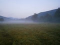 Foggy Italian valley by morning Royalty Free Stock Photo