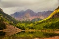 Foggy view in fall of majestic maroon bells mountains in Colorado Royalty Free Stock Photo