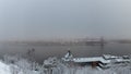 Foggy view over the river Riddarfjarden in Stockholm Sweden on a day with snow melting Royalty Free Stock Photo
