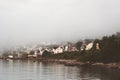 Foggy village Fjordgard houses in Norway