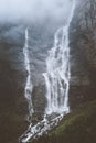 Foggy waterfall landscape in Norway rocky mountain nature Royalty Free Stock Photo