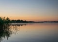 Foggy weather early in the morning on the lake. beautiful wallpapers. a mystical mist vibrates in the lake. summer sunrise