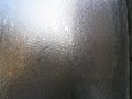 Foggy window. Closeup shot of a steamy window with water drops Royalty Free Stock Photo