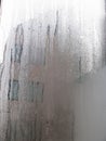 Foggy window. Closeup shot of a steamy window with water drops Royalty Free Stock Photo