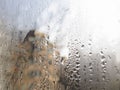 Foggy window. Closeup shot of a steamy window with water drops Royalty Free Stock Photo