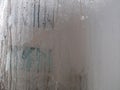 Foggy window. Closeup shot of a steamy window with water drops Royalty Free Stock Photo