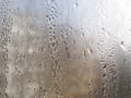 Foggy window. Closeup shot of a steamy window with water drops Royalty Free Stock Photo