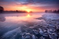 foggy winter sunrise over a frozen lake