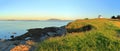 Gulf Islands National Park with Evening Light on Foghorn Station and Rosario Strait at East Point on Saturna Island, BC, Canada Royalty Free Stock Photo