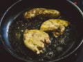 Foie gras being cooked in a pan close up Royalty Free Stock Photo