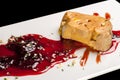 Foie gras with red fruit sauce.