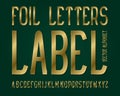 Foil Letters Label typeface. Golden font. Isolated english alphabet