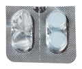 Foil packet for tablets with two blue tablets Royalty Free Stock Photo