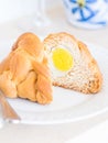 Folar, a traditional Portuguese Easter bread with a whole egg inside