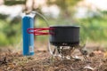 Foldable camping gas fire system with gas baloon and a pot with radiator for fast heating