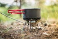 Foldable camping gas fire system with a pot with radiator for fast heating