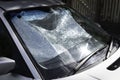 Foldable reflective sunshade on the inside of a car windshield Royalty Free Stock Photo