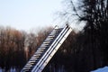 foldaway metal ladder in the park in the winter for work at height.