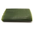 Folded banana leaves for food wrap on white background.