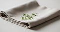 Folded beige cloth napkin on a Royalty Free Stock Photo