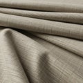 Folded beige fabric with a textured surface and visible weave patterns, resembling line Royalty Free Stock Photo