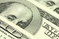 Folded bills of one hundred dollars amerianskih background Royalty Free Stock Photo