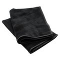 Folded Black Microfiber Cleaning Cloth with Textured Surface towel Royalty Free Stock Photo