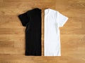 Folded black and white T-shirts