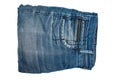Folded Blue Denim Jeans on white Background Royalty Free Stock Photo