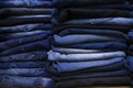 folded blue jeans pant pattern texture can be used as a background Royalty Free Stock Photo