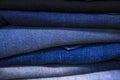 folded blue jeans pant pattern texture can be used as a background Royalty Free Stock Photo