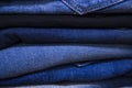 folded blue jeans pant pattern texture can be used as a background Royalty Free Stock Photo