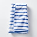 Folded Blue And White Striped Blanket On A Plain White Background Royalty Free Stock Photo