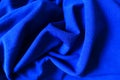 Folded bright electric blue fabric