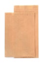 Folded brown kraft paper bags