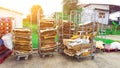 Folded cartons on metal pushcarts waiting for recycle Royalty Free Stock Photo